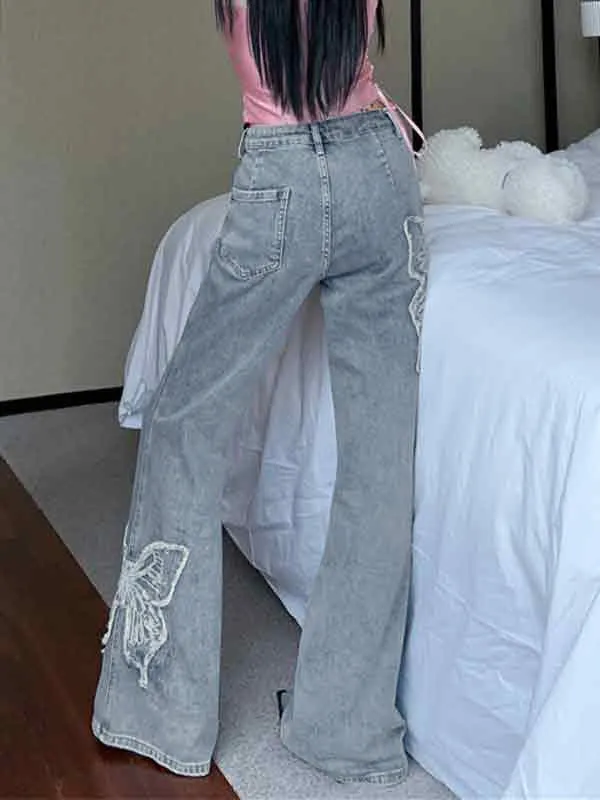 Wenkouban Flared trousers with butterfly embroidery